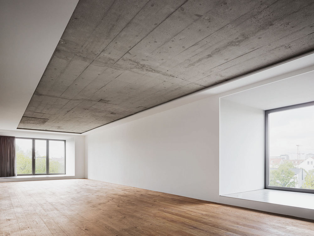 Umbau eines Luftschutzbunkers in München, raumstation Architekten 2014: Nach dem Totalumbau beherbergt das Bauwerk vier mehrgeschossige Wohnungen und eine Galerie.