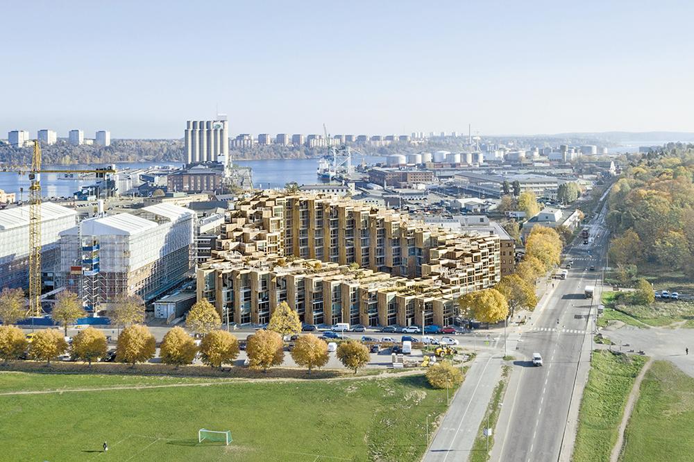 Die Drehung des Rasters um 45° und die Terrassierung verschaffen sowohl den Wohnungen zum Innenhof als auch zu den Nachbargebäuden Licht und Ausblicke.