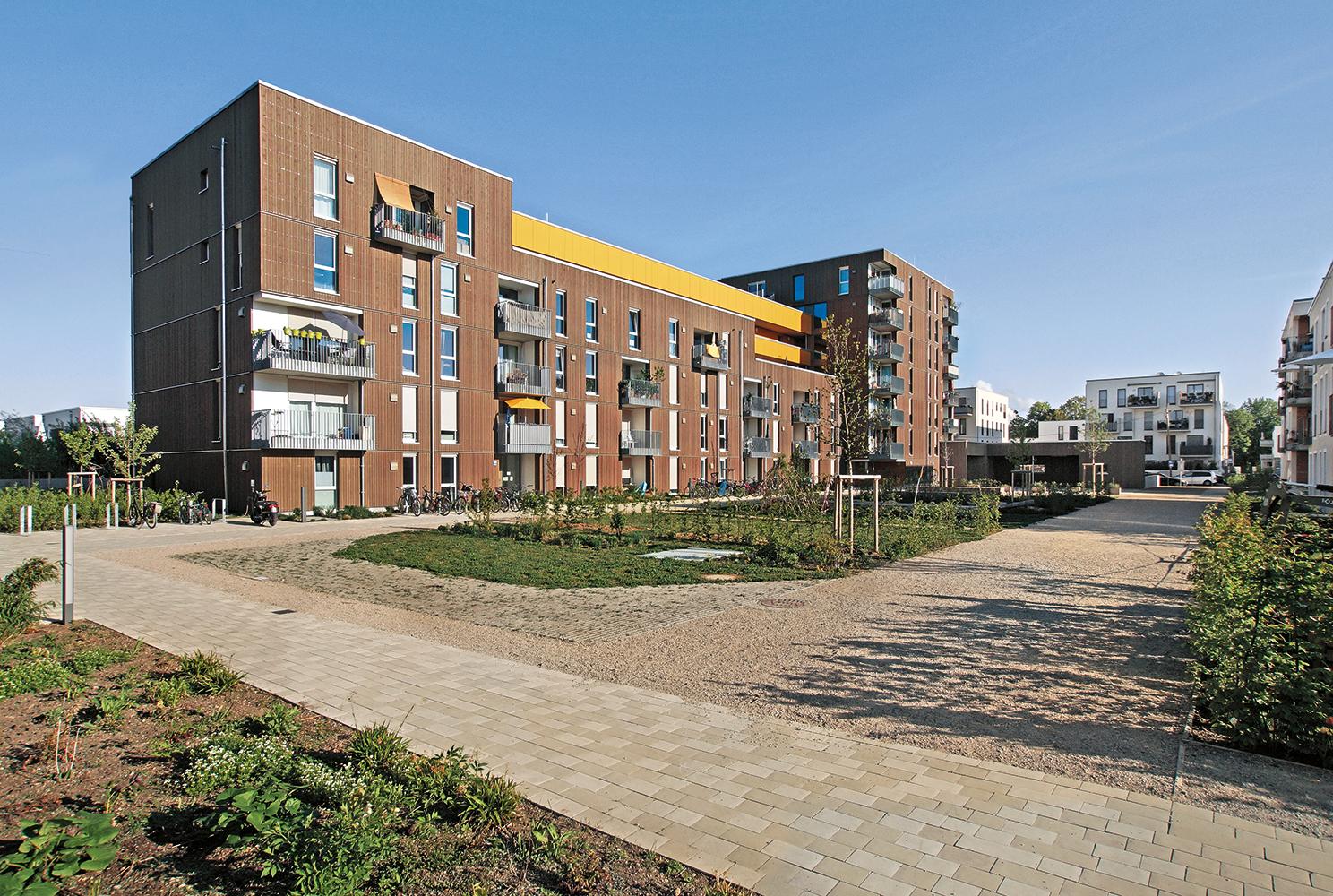In Hybridbauweise entstand dieser Neubau des Büros Zwischenräume für zwei Münchener Genossenschaften.