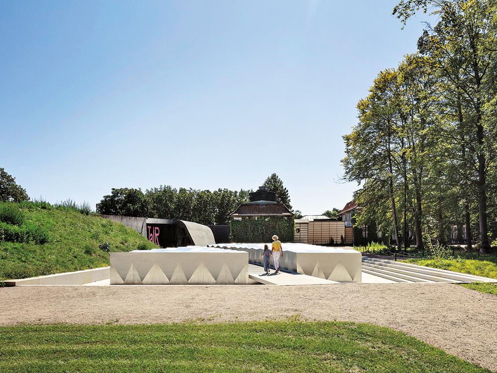 A path cuts through the middle of Snøhetta’s sculptural steel structure, leading to the museum entrance. Beneath its faceted surface lies the largest of the five new exhibition spaces.