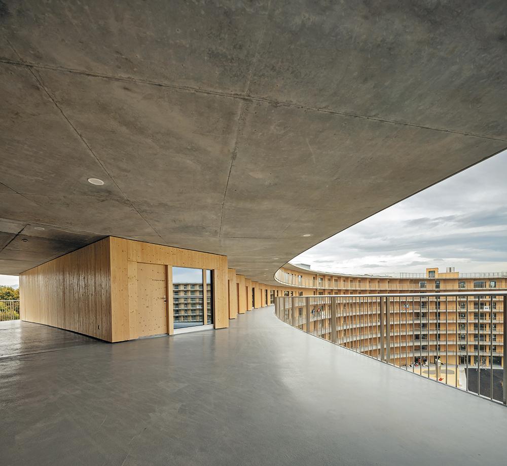 Passages from the exterior to the interior access balcony transform building access into an experience for the users. Each floor features shared kitchens and laundry rooms.