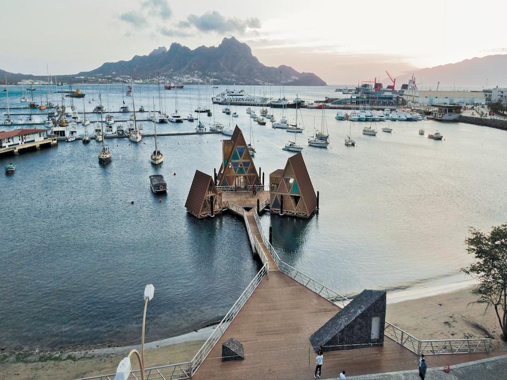 The Floating Music Hub is a space for music and cultural events made of prefabricated timber elements. It is anchored in Mindelo, Cape Verde.