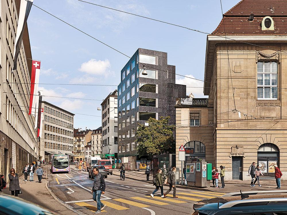 Auf den ersten Blick tritt der achtgeschossige Neubau als Solitär in Erscheinung. Er ist jedoch Bestandteil einer dreiseitig geschlossenen Blockrandbebauung.