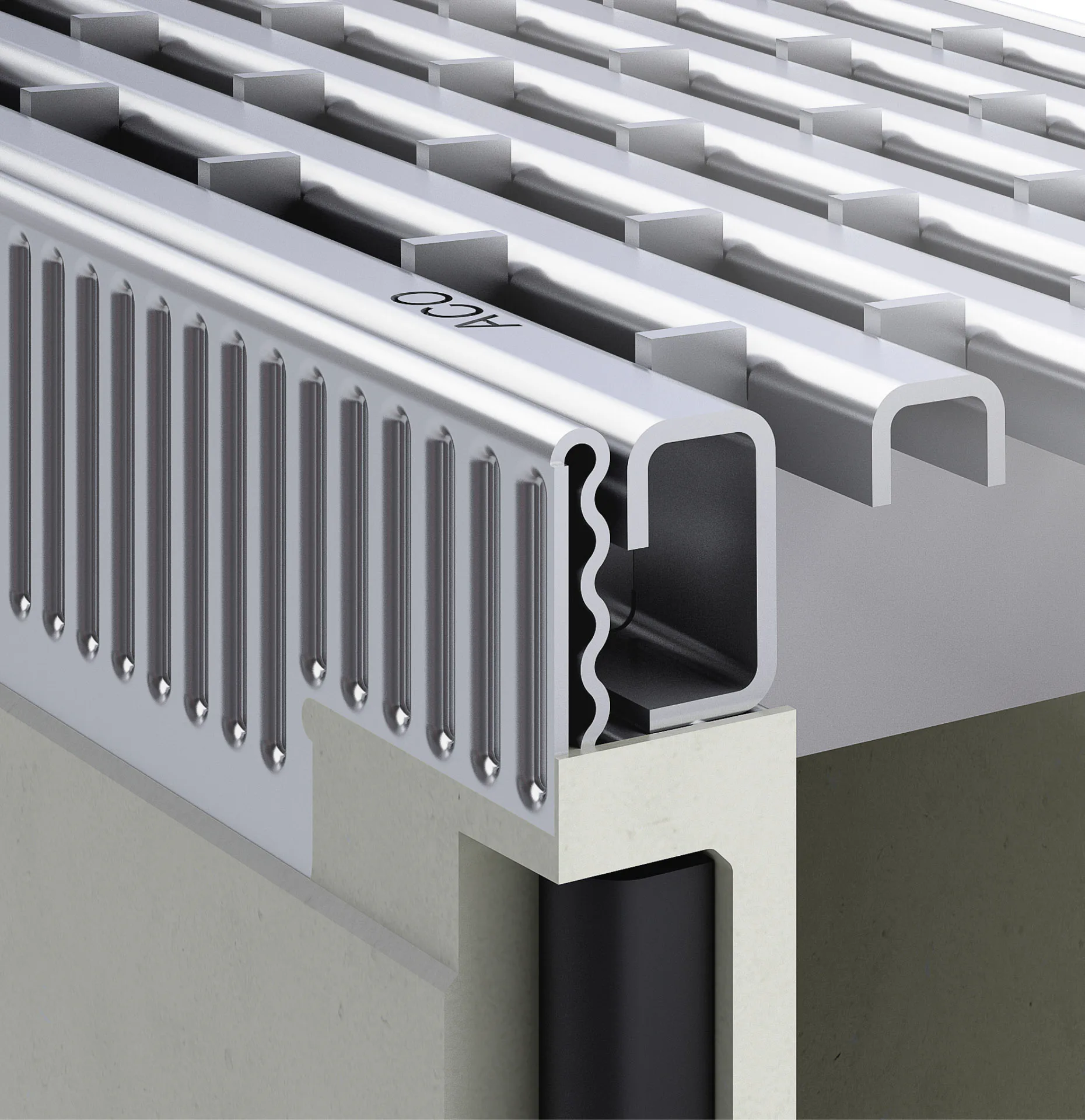 Aco Drain Multiline aus Nexite Spezialbeton mit verzinktem Kantenschutz und Längsprofilrost.