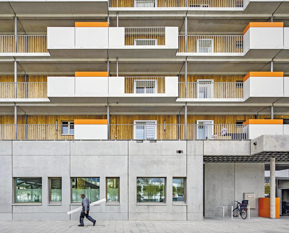 150 Genossenschaftswohnungen, viele davon gefördert, vereinten Zwingel/Dilg in diesem Neubau in München-Riem. Er wurde größtenteils in Holzbauweise erstellt.