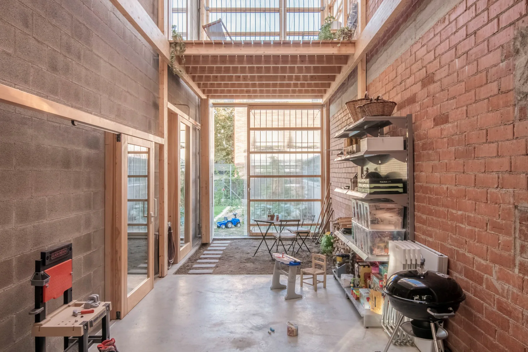 The unheated sunroom is a wooden construction with a polycarbonate shell.
