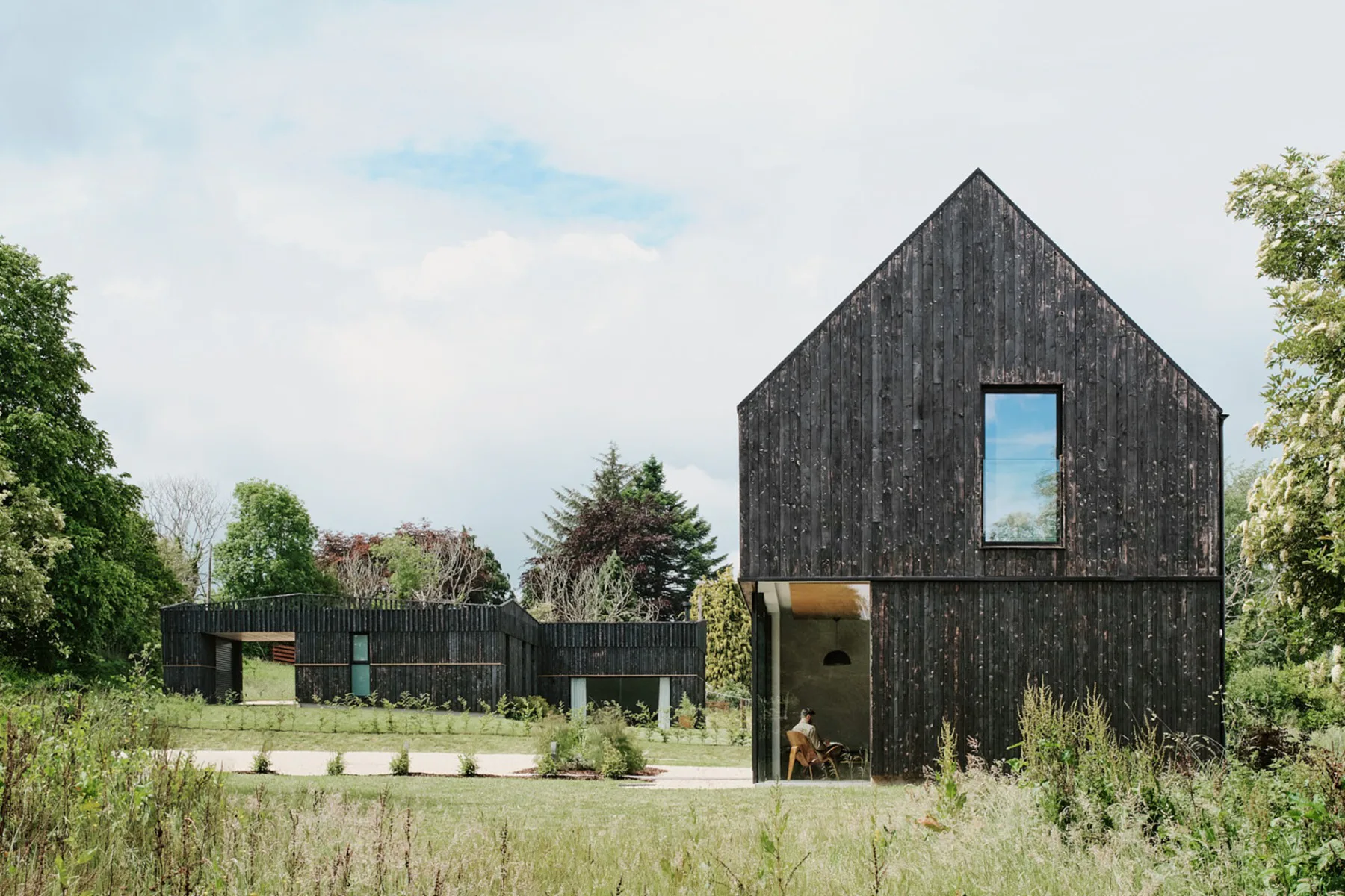 The two buildings planned by Loader Monteith stand on the Beauly Firth west of Inverness.