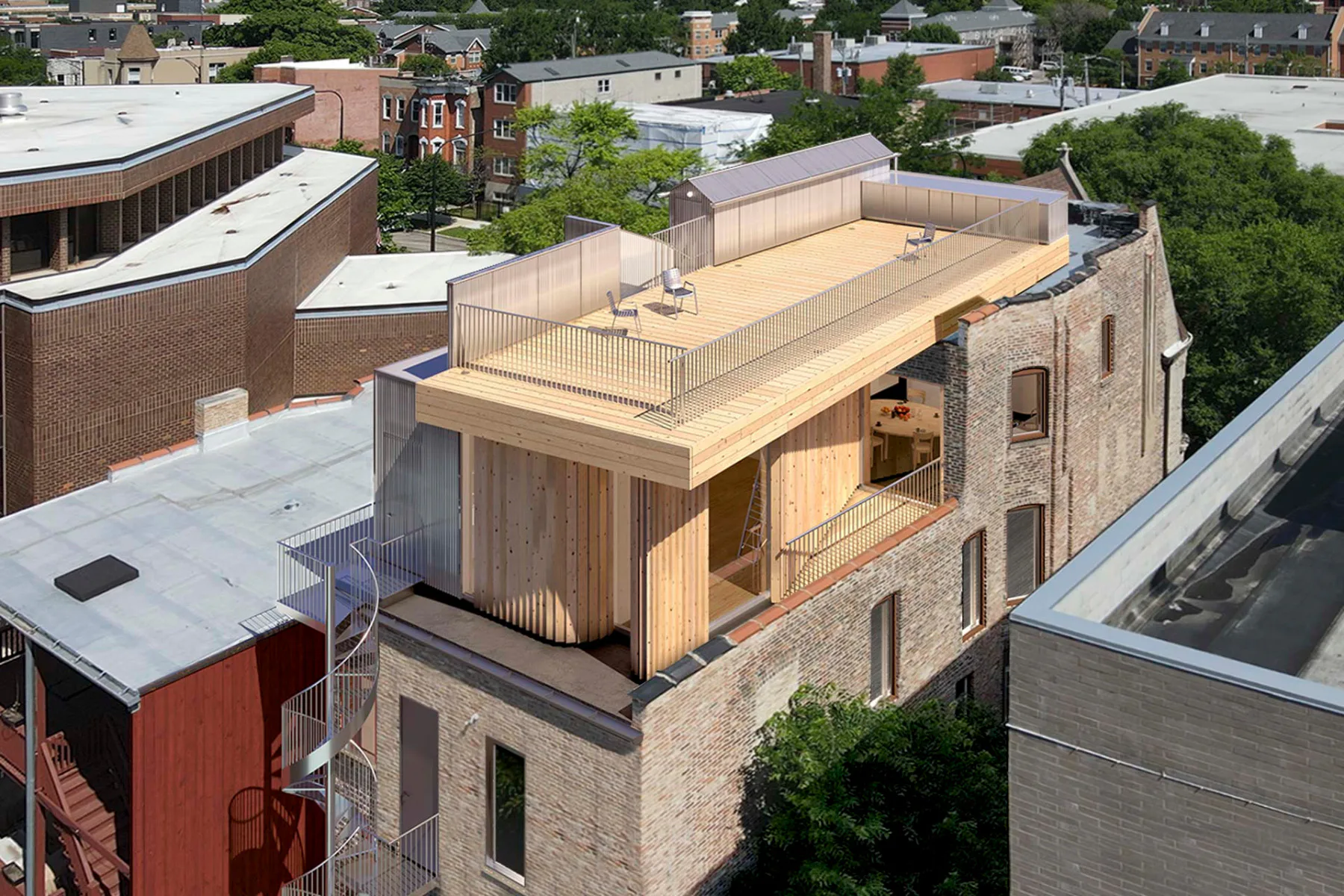 Der von Kwong Von Glinow entworfene Anbau im dritten Stock eines Greystone-Gebäudes in West Chicago erweitert die Dachfläche zu einer großzügigen Terrasse mit Skyline-Blick.