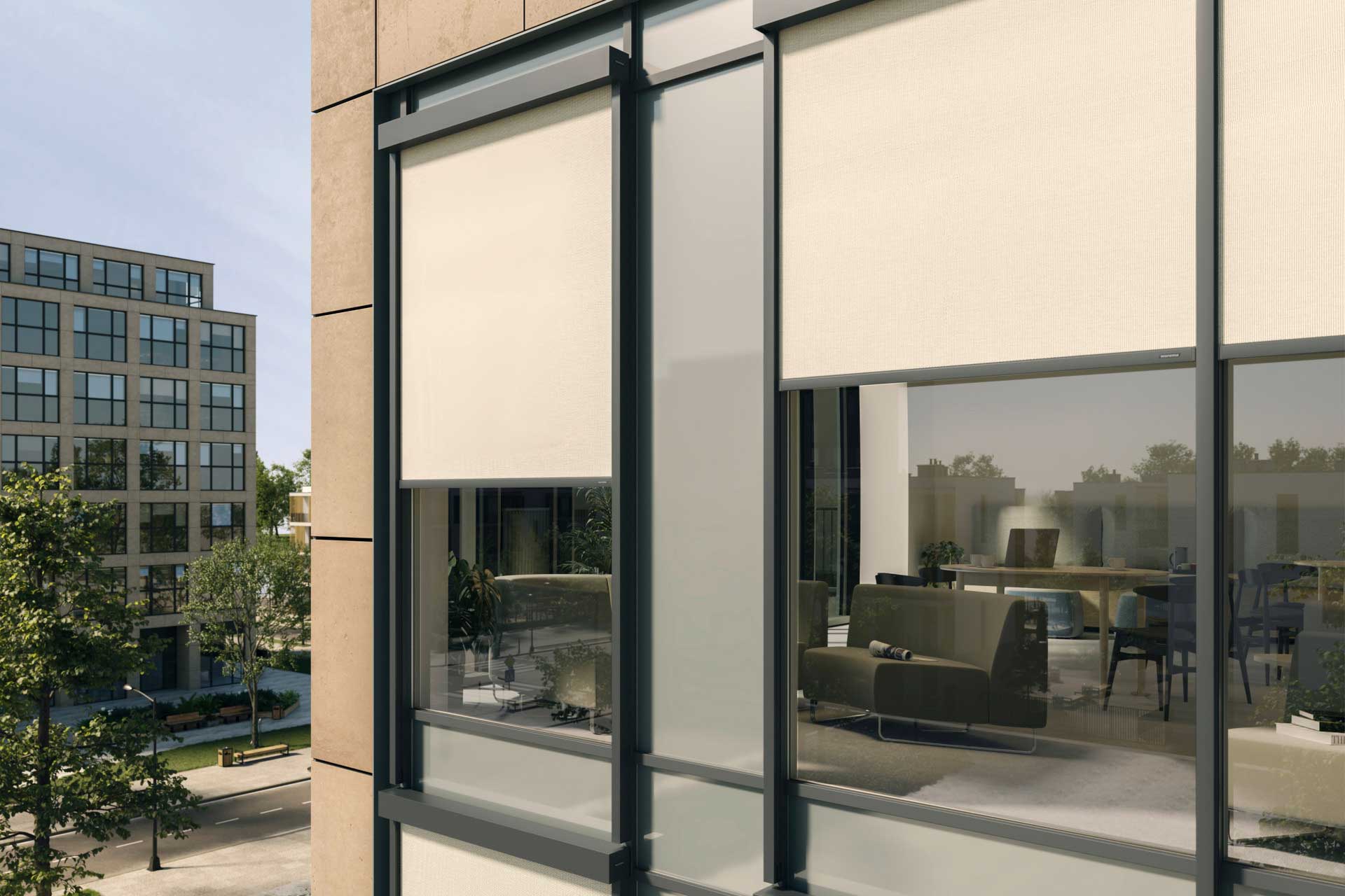 Die easyZIP-Führungsschienen der Markisen sind optisch perfekt in die Pfosten-Riegel-Fassade integriert.