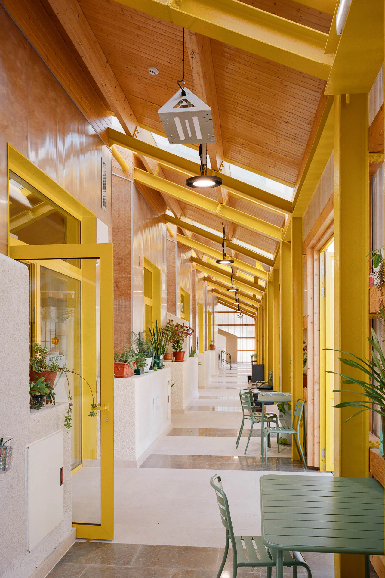 The upper-floor corridor is designed as a continuous walkway.