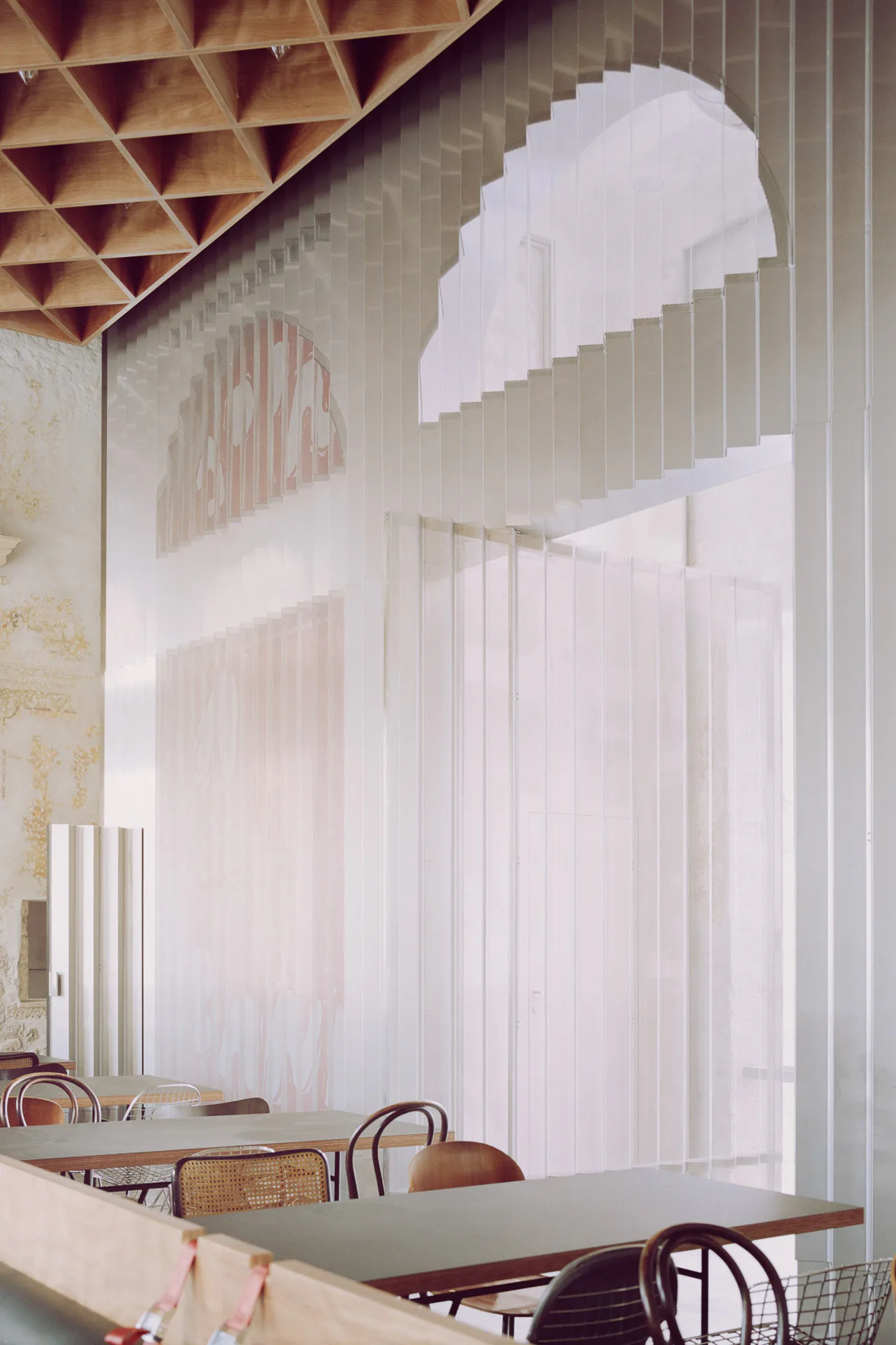 Transparent materials create visual connections and make the room appear larger.