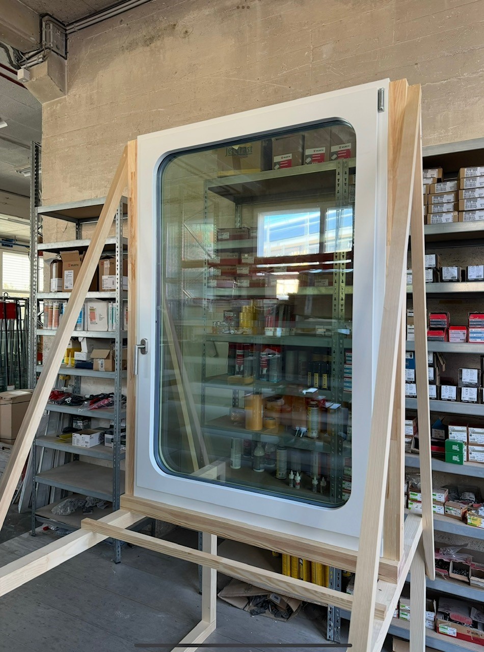 Former railway carriage windows are fitted in pairs into new frames and mounted on the façades.